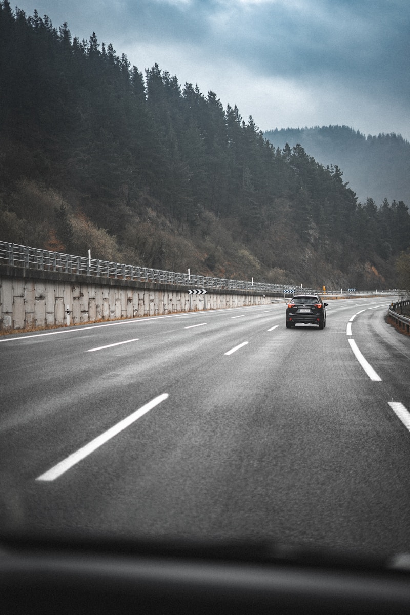 black car on road during daytime