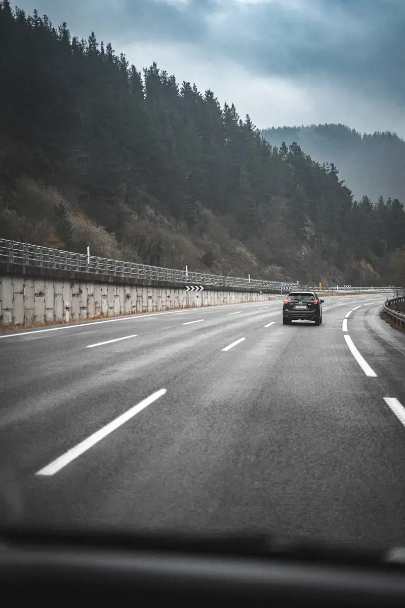 black car on road during daytime