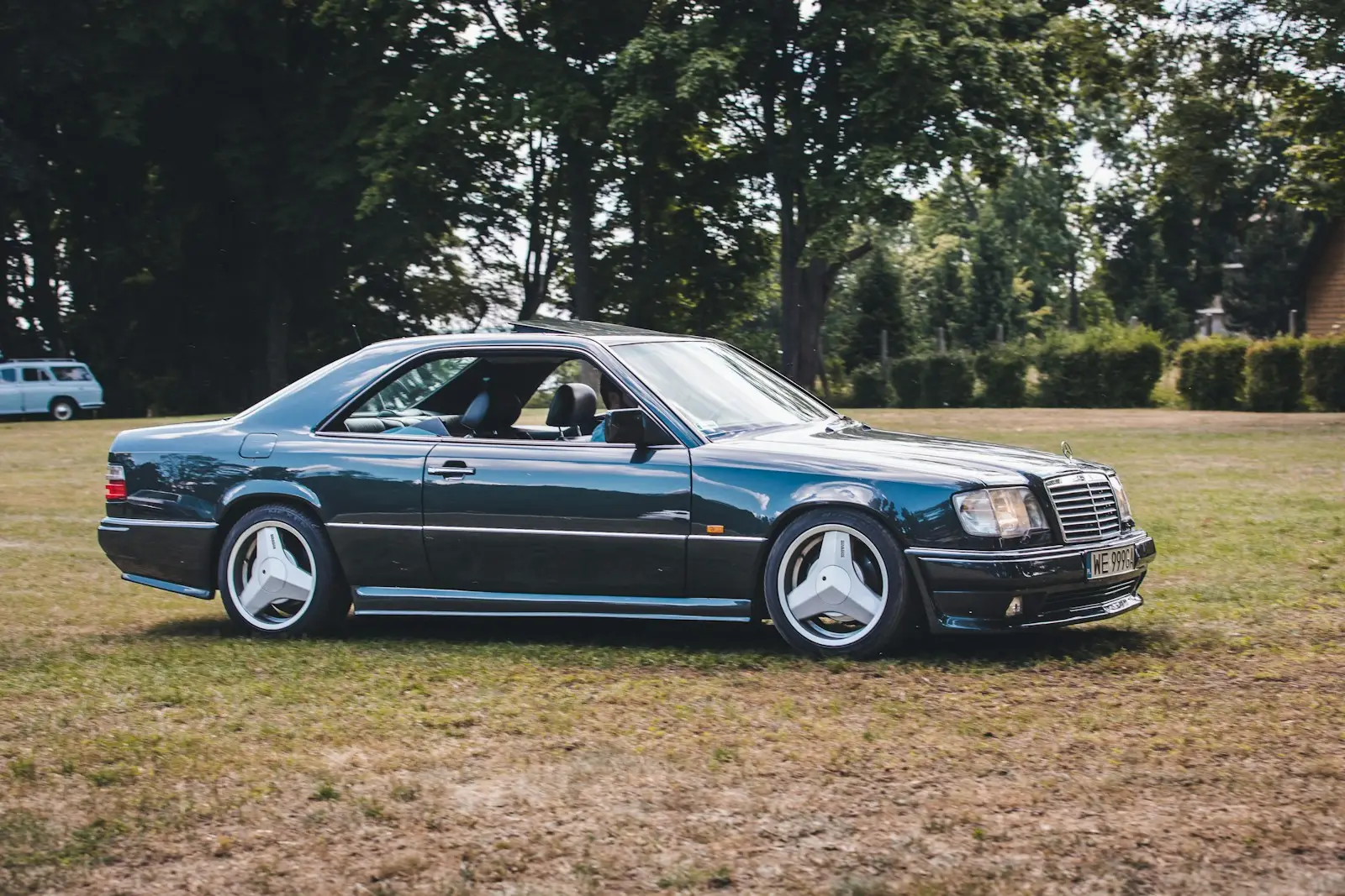 a blue mercedes benz covered by liberty mutual car insurance